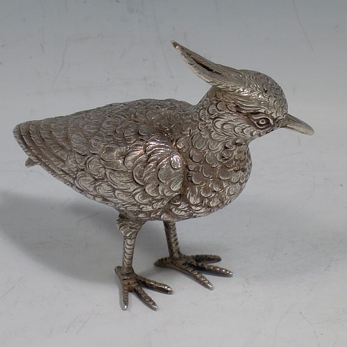 A Continental 800 standard cast Silver model of a lapwing, having realistically hand-chased feathers and body. Made in ca. 1930 having a 800 standard mark. The dimensions of this fine hand-made silver lapwing bird model are height 16.5 cms (6.5 inches), length 8 cms (3 inches), length 8 cms (3 inches), and it weighs approx. 83g (2.7 troy ounces).