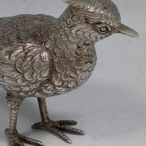 A Continental 800 standard cast Silver model of a lapwing, having realistically hand-chased feathers and body. Made in ca. 1930 having a 800 standard mark. The dimensions of this fine hand-made silver lapwing bird model are height 16.5 cms (6.5 inches), length 8 cms (3 inches), length 8 cms (3 inches), and it weighs approx. 83g (2.7 troy ounces).
