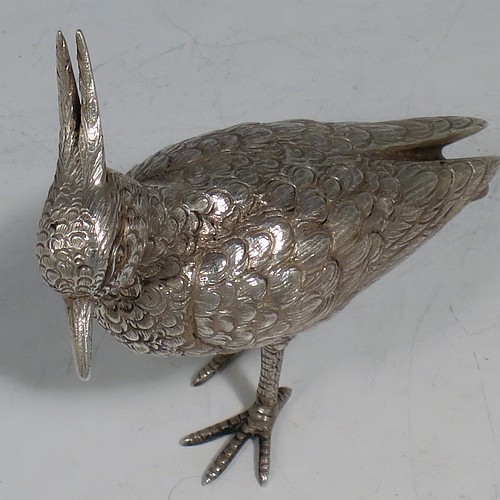 A Continental 800 standard cast Silver model of a lapwing, having realistically hand-chased feathers and body. Made in ca. 1930 having a 800 standard mark. The dimensions of this fine hand-made silver lapwing bird model are height 16.5 cms (6.5 inches), length 8 cms (3 inches), length 8 cms (3 inches), and it weighs approx. 83g (2.7 troy ounces).