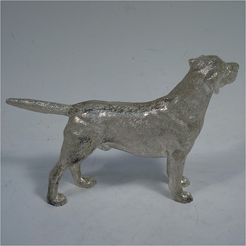 A very handsome Sterling Silver cast model of a male Labrador gun dog, having a realistically hand-chased body. Made in London in 2016. The dimensions of this fine hand-made cast sterling silver Labrador dog model are height 8.5 cms (3.3 inches), length 12.5 cms (5 inches), width 2.5 cms (1 inch), and it weighs approx. 275g (8.9 troy ounces).