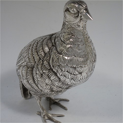 A very handsome and large pair of Antique Edwardian Silver-Plated partridge bird models, having realistically hand-chased feathers, faces, and feet. Made in ca. 1910 in England. The dimensions of this fine hand-made antique silver plated pair of partridge model birds are height 16.5 cms (6.5 inches), length 19 cms (7.5 inches), and width 7.5 cms (3 inches).