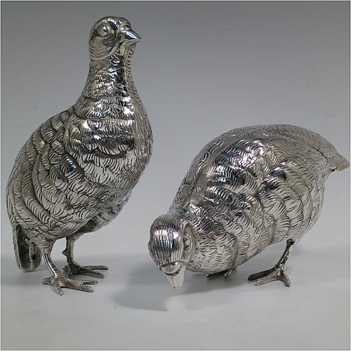 A very handsome and large pair of Antique Edwardian Silver-Plated partridge bird models, having realistically hand-chased feathers, faces, and feet. Made in ca. 1910 in England. The dimensions of this fine hand-made antique silver plated pair of partridge model birds are height 16.5 cms (6.5 inches), length 19 cms (7.5 inches), and width 7.5 cms (3 inches).