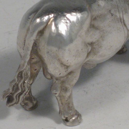 Sterling silver fine cast model of a Herefordshire bull, made in London in 2002. Length 9 cms (3.5 inches), height 5 cms (2 inches). Weight approx. 337g (10.9 troy ounces)
