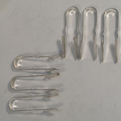 An elegant set of six Antique Victorian Sterling Silver asparagus eating tongs, in a very plain style. These handsome silver asparagus eaters were made by William Henry Skinner of London in 1896. The dimensions of this fine set of six antique sterling silver asparagus eating tongs are length 11 cms (4.25 inches), and they weigh a total of approx. 191g (6.2 troy ounces).