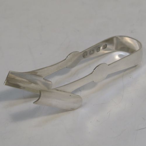 An elegant set of six Antique Victorian Sterling Silver asparagus eating tongs, in a very plain style. These handsome silver asparagus eaters were made by William Henry Skinner of London in 1896. The dimensions of this fine set of six antique sterling silver asparagus eating tongs are length 11 cms (4.25 inches), and they weigh a total of approx. 191g (6.2 troy ounces).