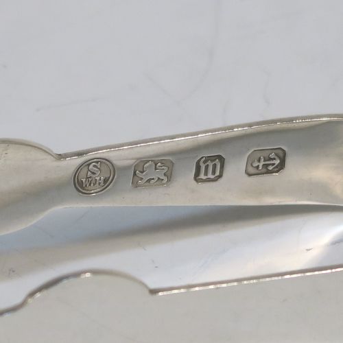An elegant set of six Antique Victorian Sterling Silver asparagus eating tongs, in a very plain style. These handsome silver asparagus eaters were made by William Henry Skinner of London in 1896. The dimensions of this fine set of six antique sterling silver asparagus eating tongs are length 11 cms (4.25 inches), and they weigh a total of approx. 191g (6.2 troy ounces).