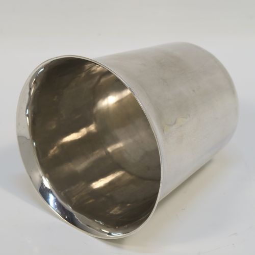 A rare and very handsome Irish Antique Georgian Sterling Silver beaker, having a very plain round body with tapering sides, and sitting on a flat base. This elegant antique Irish silver beaker was made by Clark and West of Dublin in 1808. The dimensions of this fine hand-made antique silver beaker are height 9 cms (3.5 inches), diameter at top 9.5 cms (3.75 inches), and it weighs approx. 180g (5.8 troy ounces).