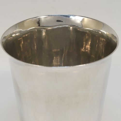 A rare and very handsome Irish Antique Georgian Sterling Silver beaker, having a very plain round body with tapering sides, and sitting on a flat base. This elegant antique Irish silver beaker was made by Clark and West of Dublin in 1808. The dimensions of this fine hand-made antique silver beaker are height 9 cms (3.5 inches), diameter at top 9.5 cms (3.75 inches), and it weighs approx. 180g (5.8 troy ounces).