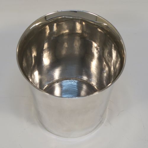 A rare and very handsome Irish Antique Georgian Sterling Silver beaker, having a very plain round body with tapering sides, and sitting on a flat base. This elegant antique Irish silver beaker was made by Clark and West of Dublin in 1808. The dimensions of this fine hand-made antique silver beaker are height 9 cms (3.5 inches), diameter at top 9.5 cms (3.75 inches), and it weighs approx. 180g (5.8 troy ounces).