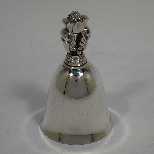 A very pretty Sterling Silver table bell having a plain round body with a cast Acorn pattern handle, and an original silver clapper. Hallmarked for C. J. Vander of London in 1960, and originally designed by Johan Rohde for Georg Jensen. The dimensions of this fine hand-made silver table bell are height 8.5 cms (3.3 inches), diameter at base 5 cms (2 inches), and it weighs approx. 88g (2.8 troy ounces).   