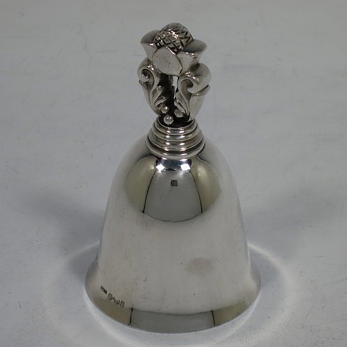 A very pretty Sterling Silver table bell having a plain round body with a cast Acorn pattern handle, and an original silver clapper. Hallmarked for C. J. Vander of London in 1960, and originally designed by Johan Rohde for Georg Jensen. The dimensions of this fine hand-made silver table bell are height 8.5 cms (3.3 inches), diameter at base 5 cms (2 inches), and it weighs approx. 88g (2.8 troy ounces).