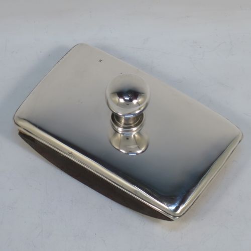 A very handsome Antique Edwardian Sterling Silver rocker blotter, having a very plain rectangular body with rounded corners, a leather covered rocker base, and a plain round handle that screws in to secure the rocker base and blotting paper to the upper body. Made by Henry Matthews of Birmingham in 1905. The dimensions of this fine hand-made antique silver rocker blotter are length 12 cms (4.75 inches), height 6 cms (2.3 inches), and width 7.5 cms (3 inches)  