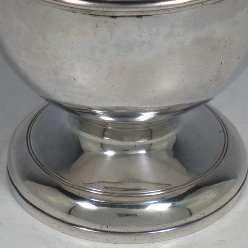 A rare Antique Georgian George II Sterling Silver small table bowl, having a plain round body, with reeded borders, and sitting on a pedestal foot. Made by Fuller White London in 1750. The dimensions of this fine hand-made antique silver bowl are diameter 9 cms (3.5 inches), height 8.5 cms (3.3 inches), and it weighs approx. 217g (7 troy ounces). Please note that this item is crested.