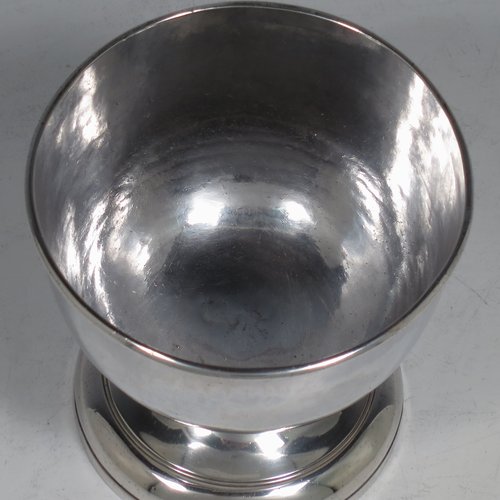 A rare Antique Georgian George II Sterling Silver small table bowl, having a plain round body, with reeded borders, and sitting on a pedestal foot. Made by Fuller White London in 1750. The dimensions of this fine hand-made antique silver bowl are diameter 9 cms (3.5 inches), height 8.5 cms (3.3 inches), and it weighs approx. 217g (7 troy ounces). Please note that this item is crested.