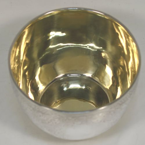 A very pretty Antique Victorian Sterling Silver bowl, having a round body with hand-engraved floral and scroll-work decoration, a gold-gilt interior, and sitting on a flat base. This beautiful antique silver bowl was made by Albert Henry Thompson of Sheffield in 1892. The dimensions of this fine hand-made antique silver bowl are height 6.5 cms (2.75 inches), diameter 10 cms (4 inches), and it weighs approx. 132g (4.3 troy ounces).