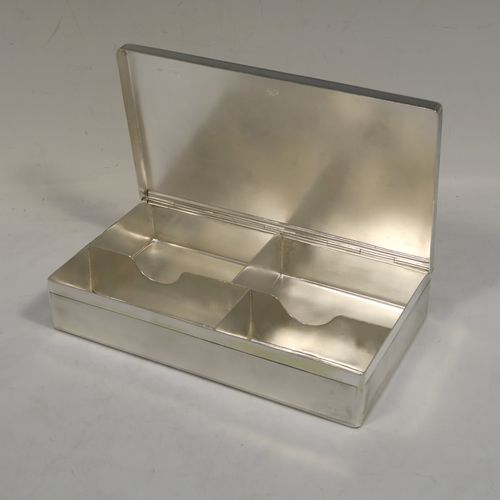 A very elegant Antique Victorian Sterling Silver table or desk box, having a rectangular body with engine-turned decoration, a vacant round cartouche on the hinged lid, a compartmentalised interior, and all sitting of a flat base. This handsome antique silver box was made by Charles and George Asprey of London in 1896. The dimensions of this fine hand-made antique silver table box are length 18.5 cms (7.25 inches), width 11 cms (4.25 inches), height 3.5 cms (1.3 inches), and it weighs approx. 569g (18.4 troy ounces)
