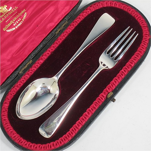 A very handsome Antique Victorian Sterling Silver christening set, having a fork and spoon, all in the plain Old English pattern, and all sitting in their original red satin and maroon velvet-lined presentation box. Made by Jackson and Fullerton of London in 1899. The dimensions of this fine hand-made antique silver christening set are length of spoon 16 cms (6.3 inches), with a total weight of approx. 60g (2 troy ounces).