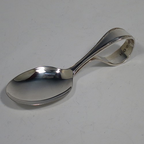 A Sterling Silver pusher, spoon, and napkin christening set, having a plain style with oval bowl, a plain pusher, and a napkin ring, all with egg and dart borders, and all sitting in their original cream satin and back velvet-lined presentation box. Made by the Arthur Price and Co. Ltd., of Birmingham in 1938. The dimensions of this fine hand-made silver christening set are length of spoon 9 cms (3.5 inches), diameter of napkin ring 4.5 cms (1.75 inches), and the total weight is approx. 53g (1.7 troy ounces).