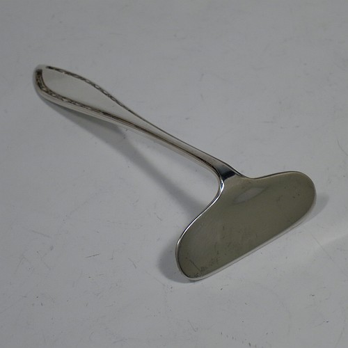 A Sterling Silver pusher, spoon, and napkin christening set, having a plain style with oval bowl, a plain pusher, and a napkin ring, all with egg and dart borders, and all sitting in their original cream satin and back velvet-lined presentation box. Made by the Arthur Price and Co. Ltd., of Birmingham in 1938. The dimensions of this fine hand-made silver christening set are length of spoon 9 cms (3.5 inches), diameter of napkin ring 4.5 cms (1.75 inches), and the total weight is approx. 53g (1.7 troy ounces).