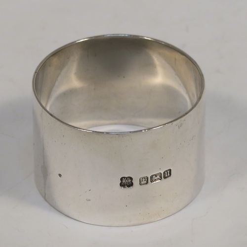 A very handsome Antique Sterling Silver christening set consisting of a plain round napkin ring, a spoon and fork in the double-struck Old English, Thread and Shell pattern, and all in their original cream satin and dark blue velvet-lined presentation box. This elegant silver christening set was mad by Martin Hall and Co., of Sheffield in 1912. The dimensions of this fine hand-made antique silver christening set are length of spoon and fork 16 cms (6.3 inches), diameter of napkin ring 4.5 cms (1.75 inches), and it has a total weight of approx. 124g (4 troy ounces).