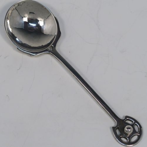 A beautiful Arts and Crafts style sterling Silver christening set, consisting of a round bellied bowl with hand-hammered decoration, and a plain spoon with a hand-pierced and applied ball handle, all sitting in their original cream satin and black velvet-lined presentation box. This fantastic Arts and Crafts silver bowl and spoon set was made by A. E. Jones of Birmingham in 1926/28. The dimensions of this fine hand-made silver christening set are length of spoon 13 cms (5 inches), diameter of bowl 13.5 cms (5.25 inches), and the total weight is approx. 178g (5.7 troy ounces).