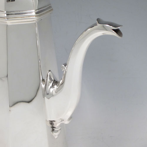 Sterling silver fine hand-made Queen Anne style coffee pot with plain panelled tapering body, hinged domed lid with finial, a panelled spout, and a scrolled wooden handle. Made by Henry Stratford Ltd., of Sheffield in 1921. The dimensions of this fine silver coffee pot are length 20 cms (8 inches), height 25.5 cms (10 inches), and it weighs approx. 650g (21 troy ounces).   