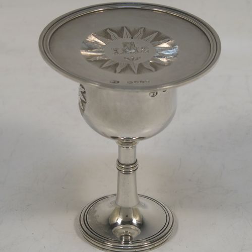 A handsome Antique Victorian Sterling Silver two-piece travelling communion set consisting of a chalice with gold-gilt interior, and a paten, both with plain round bodies and having applied reeded borders. This beautiful travelling communion set was made by William Summers of London in 1868. The dimensions of this fine antique silver travelling communion set are height of chalice 8 cms (3 inches), diameter of paten 6.5 cms (2.5 inches), and with a total weight of approx. 73g (2.3 troy ounces). Please note that both these items have hand engraved christograms.