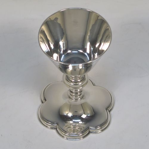 An elegant Antique Victorian Sterling Silver small travelling communion chalice, having a plain round tapering cup, a middle plain round baluster, and sitting on a hexafoil pedestal foot. This beautiful antique silver chalice was made by Blunt and Wray of London in 1897. The dimensions of this fine hand-made silver chalice are height 9 cms (3.5 inches), diameter of cup 5 cms (2 inches), and a weight of approx. 86g (2.8 troy ounces). Please note that this item is engraved with the Latin inscription Poculum Caritatis which stands for The Cup of Kindness.
