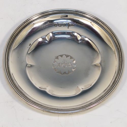 A very handsome Antique Victorian Sterling Silver three-piece travelling communion set consisting of chalice, paten, and wine ewer. The chalice having a plain round bellied body with a hexagonal stem and shaped round pedestal foot. The paten having a round body with an applied reeded border, and sitting on a flat base. The wine ewer having a plain bellied body, a pull-off top with cork stopper and cruciform finial, a scroll side-handle, and sitting on a matching pedestal foot. All three pieces are hand-engraved with an IHS Christogram, and they are all sitting in their original dark blue velvet-lined presentation box which has a contemporaneous presentation inscription on a brass plaque. This beautiful communion service was all made by Walker and Hall of Sheffield in 1896. The dimensions of this fine hand-made antique silver travelling communion set are height of chalice 9 cms (3.5 inches), diameter of paten 8.5 cms (3.3 inches), height of wine ewer 10.5 cms (4 inches), and with a total weight of approx. 238g (7.7 troy ounces).