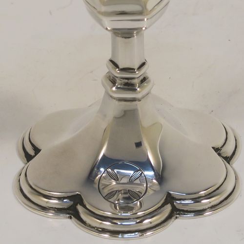A handsome Antique Sterling Silver small travelling communion chalice, having a plain round tapering cup, a middle hexagonal baluster, and sitting on a hexafoil pedestal foot. This beautiful antique silver chalice was made in London in 1919. The dimensions of this fine hand-made silver chalice are height 10 cms (4 inches), diameter of cup 5 cms (2 inches), and a weight of approx. 78g (2.5 troy ounces).   