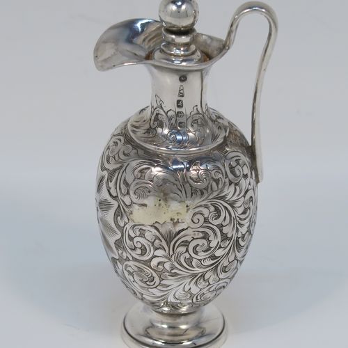 A beautiful Antique Victorian Sterling Silver three-piece travelling communion set consisting of chalice, paten, and wine flagon. In a round bellied style, having the remains of a gold-gilt interior to the chalice, an amphora style flagon, and a paten with an applied border and pedestal foot, all over hand-engraved with floral and scroll decoration. This very pretty silver communion set was made by Yapp and Woodward of Birmingham in 1849. The dimensions of this fine hand-made antique silver travelling communion set are height of flagon 9 cms (3.5 inches), diameter of paten 6.5 cms (2.5 inches), and with a total weight of approx. 129g (4 troy ounces). Please note that all items are engraved with a Christogram, and the paten and chalice are engraved with contemporaneous sets of initials.   