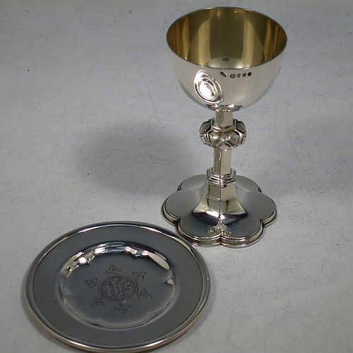 An Antique Victorian Sterling Silver small travelling communion chalice and paten, the chalice having a plain round cup with gold-gilt interior, a central cast baluster, and sitting on a hexafoil pedestal foot. The paten having a plain round body with hand-chased hexafoil ground and an applied rim. Made by the Barnard Brothers of London in 1875 (chalice) and 1878 (paten). The dimensions of this fine hand-made antique silver travelling communion set are height of chalice 9 cms (3.5 inches), diameter of paten 7.5 cms (3 inches), with a total weight of approx. 85g (2.7 troy ounces). Please note that both the chalice and paten are engraved with a Christogram.