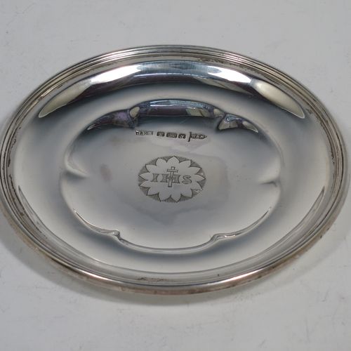 An Antique Victorian Sterling Silver three-piece travelling communion set consisting of a chalice, paten, and wine bottle. The chalice having a plain round cup with a gold-gilt interior, a hand-chased middle baluster stem, and sitting on a spreading hexafoil pedestal foot. The paten having a plain round body with a hexafoil shaped interior and applied reeded border. The wine bottle having a plain round screw-off corked lid, and the glass body with tapering sides and flat base. All three pieces sit in their original dark blue velvet-lined presentation box. Made by Walker and Hall of Sheffield in 1892. The dimensions of this fine hand-made antique silver travelling communion set are height of chalice 10 cms (4 inches), diameter of paten 8.5 cms (3.3 inches), height of bottle 8 cms (3 inches), and with a total weight of approx. 125g (4 troy ounces).   