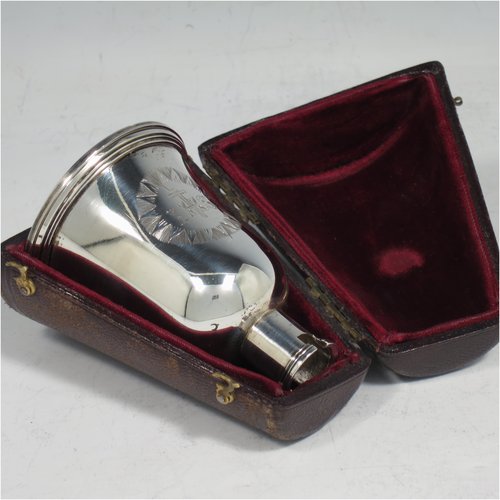 A rare Antique Georgian (William IV) Sterling Silver collapsible travelling communion set, consisting of a chalice, paten, and bottle, with a bayonet-fit mechanism. The chalice having a round body with reeded borders, and a gold-gilt interior. The bottle having the same style, but slightly smaller to fit inside the goblet when collapsed, and a pull-off stopper. The paten having a round body with a reeded border, and sitting on a collet foot. All three are engraved with a Christogram, and all sit in their original maroon velvet-lined and leather presentation box. Made by Charles Rawlings & William Summer of London in 1836. The dimensions of this fine hand-made silver travelling communion set are height (when attached together) 11 cms (4.25 inches), diameter of paten 5 cms (2 inches), and with a total weight of approx. 125g (4 troy ounces).    