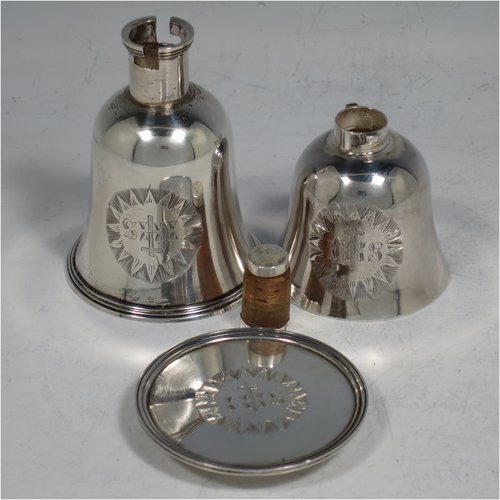 A rare Antique Georgian (William IV) Sterling Silver collapsible travelling communion set, consisting of a chalice, paten, and bottle, with a bayonet-fit mechanism. The chalice having a round body with reeded borders, and a gold-gilt interior. The bottle having the same style, but slightly smaller to fit inside the goblet when collapsed, and a pull-off stopper. The paten having a round body with a reeded border, and sitting on a collet foot. All three are engraved with a Christogram, and all sit in their original maroon velvet-lined and leather presentation box. Made by Charles Rawlings & William Summer of London in 1836. The dimensions of this fine hand-made silver travelling communion set are height (when attached together) 11 cms (4.25 inches), diameter of paten 5 cms (2 inches), and with a total weight of approx. 125g (4 troy ounces).