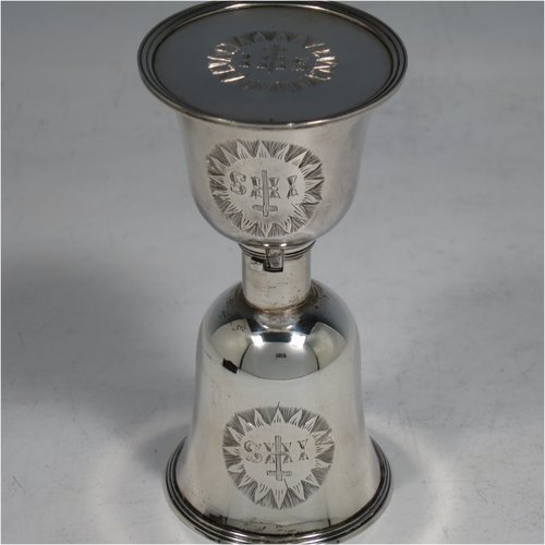 A rare Antique Georgian (William IV) Sterling Silver collapsible travelling communion set, consisting of a chalice, paten, and bottle, with a bayonet-fit mechanism. The chalice having a round body with reeded borders, and a gold-gilt interior. The bottle having the same style, but slightly smaller to fit inside the goblet when collapsed, and a pull-off stopper. The paten having a round body with a reeded border, and sitting on a collet foot. All three are engraved with a Christogram, and all sit in their original maroon velvet-lined and leather presentation box. Made by Charles Rawlings & William Summer of London in 1836. The dimensions of this fine hand-made silver travelling communion set are height (when attached together) 11 cms (4.25 inches), diameter of paten 5 cms (2 inches), and with a total weight of approx. 125g (4 troy ounces).