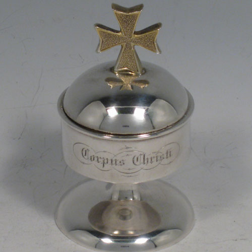 Antique Victorian Scottish sterling silver three-piece travelling communion set consisting of a covered chalice, an annointing spoon, and a ciborium, in original velvet and satin-lined presentation box. Both the chalice and ciborium have sealed lids with cast gold-gilt cruciform handles. The chalice is engraved with Sanguis Christi (blood of Christ), and the ciborium with Corpus Christi (body of Christ). The spoon has a gold-gilt bowl, twisted stem, and a cast figure of Christ. The chalice was made in Edinburgh in 1872, whereas the Ciborium and spoon were made in Glasgow in 1867. Height of chalice 13 cms (5 inches), length of spoon 12 cms (4.75 inches). Total weight approz. 183g (5.9 troy ounces).