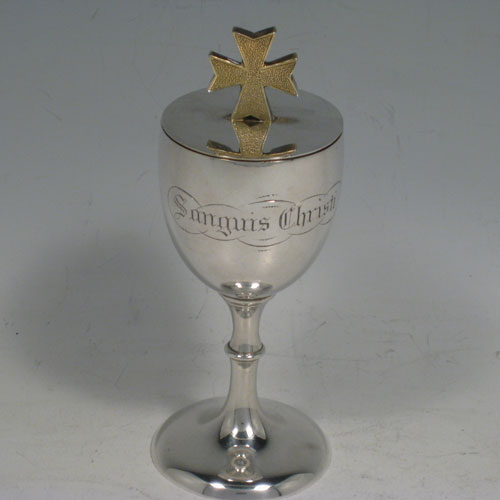 Antique Victorian Scottish sterling silver three-piece travelling communion set consisting of a covered chalice, an annointing spoon, and a ciborium, in original velvet and satin-lined presentation box. Both the chalice and ciborium have sealed lids with cast gold-gilt cruciform handles. The chalice is engraved with Sanguis Christi (blood of Christ), and the ciborium with Corpus Christi (body of Christ). The spoon has a gold-gilt bowl, twisted stem, and a cast figure of Christ. The chalice was made in Edinburgh in 1872, whereas the Ciborium and spoon were made in Glasgow in 1867. Height of chalice 13 cms (5 inches), length of spoon 12 cms (4.75 inches). Total weight approz. 183g (5.9 troy ounces).