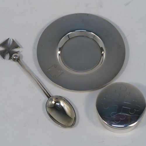 A large and complete Antique Sterling Silver six-piece travelling communion set consisting of chalice, paten, water, and wine bottles, a wafer pyx box, and an anointing spoon. The chalice having a plain round body with tapering sides, a gold-gilt interior, and sitting on a round pedestal foot. The paten and pyx box having plain round bodies. The wine and water bottles having plain round screw-off lids, cork seals, and hand-cut crystal bodies. All sitting in their original dark blue satin and velvet-lined presentation box with secure catches and carrying handles. All made by Blut and Wray of London in 1915. The dimensions of this fine hand-made antique silver travelling communion set are height of chalice 9 cms (3.5 inches), diameter of paten 8 cms (3.25 inches), and with a total weight of approx. 150g (4.8 troy ounces).