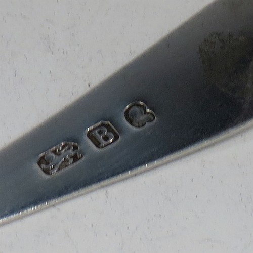 An Antique Georgian Sterling Silver pair of salt spoons, in the Old English pattern. Made in London in 1797. The dimensions of these fine hand-made antique silver salt spoons are length 10 cms (4 inches), and they weigh a total of approx. 17g (0.5 troy ounces).