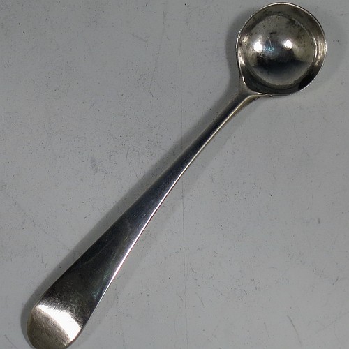 An Antique Georgian Sterling Silver pair of salt spoons, in the Old English pattern. Made in London in 1797. The dimensions of these fine hand-made antique silver salt spoons are length 10 cms (4 inches), and they weigh a total of approx. 17g (0.5 troy ounces).
