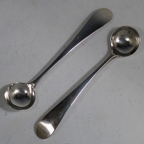 An Antique Georgian Sterling Silver pair of salt spoons, in the Old English pattern. Made in London in 1797. The dimensions of these fine hand-made antique silver salt spoons are length 10 cms (4 inches), and they weigh a total of approx. 17g (0.5 troy ounces).
