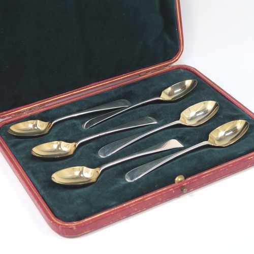 A rare Antique Victorian Sterling Silver set of six egg condiment spoons, in the Old English pattern, having plain handles with a pip on the reverse, and with gold-gilt bowls, all in their original dark green velvet-lined presentation box. These beautiful silver condiment egg spoons were made by Jackson and Fullerton of London in 1901. The dimensions of these fine hand-made antique silver egg spoons are length 12 cms (4.75 inches), and they weigh a total of approx. 100g (3.2 troy ounces). Please note that these are original egg spoons, not altered teaspoons. Also please note that they are all crested.   