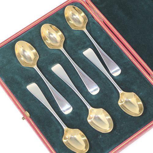 A rare Antique Victorian Sterling Silver set of six egg condiment spoons, in the Old English pattern, having plain handles with a pip on the reverse, and with gold-gilt bowls, all in their original dark green velvet-lined presentation box. These beautiful silver condiment egg spoons were made by Jackson and Fullerton of London in 1901. The dimensions of these fine hand-made antique silver egg spoons are length 12 cms (4.75 inches), and they weigh a total of approx. 100g (3.2 troy ounces). Please note that these are original egg spoons, not altered teaspoons. Also please note that they are all crested.