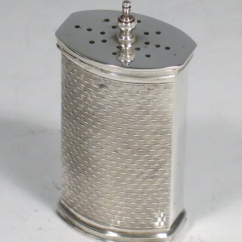 A Sterling Silver Art Deco condiment service, having oval straight-sided bodies with engine-turned decoration, with original blue-glass liners, pull-off lids on the peppers, hinged lids on the mustards, and all in original velvet and satin-lined presentation box. Consisting of two mustard pots, two pepper pots, two salt cellars, and four condiment spoons. Made in Chester and Birmingham from 1930 to 1934. Height of peppers 6.5 cms (2.5 inches), length of mustard 8 cms (3 inches), and a total weight of approx. 248g (8 troy ounces).