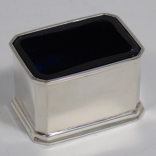 A Sterling Silver Art Deco ten piece condiment service, having octagonal straight-sided bodies, with original blue-glass liners, pull-off lids on the peppers, hinged lids on the mustards, and all in original green velvet and cream satin-lined presentation box. Consisting of two mustard pots, four pepper pots, four salt cellars, and six condiment spoons. Made by Edward and Sons of Birmingham in 1927. The dimensions of this fine hand-made sterling silver condiment service are height of peppers 7 cms (2.75 inches), length of mustard 6.5 cms (2.5 inches), and a total weight of approx. 323g (10.4 troy ounces). Please note that the silver condiment spoons are hallmarked new.