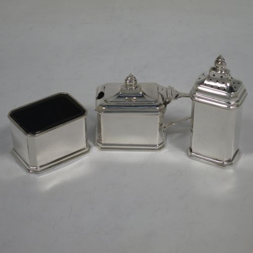A very handsome Sterling Silver Art Deco six piece condiment service, having octagonal straight-sided bodies, with original blue-glass liners, pull-off lids on the peppers, hinged lids on the mustards, and all in their original dark blue velvet and cream satin-lined presentation box. Consisting of two mustard pots, two pepper pots, two salt cellars, and four condiment spoons. Made by Mappin and Webb of Birmingham in 1928/29. The dimensions of this fine hand-made sterling silver condiment service are height of peppers 7 cms (2.75 inches), length of mustard 6.5 cms (2.5 inches), and a total weight of approx. 190g (6.1 troy ounces). Please note that the silver condiment spoons are made by the Adie Brothers of Birmingham in 1929.   