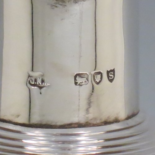 An Antique Victorian large Sterling Silver and cut-crystal glug-glug decanter, having a ribbed body with pinched and fluted central waists, plain round necks with four pouring spouts, and original hand-cut stopper. Made by John N. Mappin of London in 1893. The dimensions of this fine hand-made silver and crystal glug glug decanter are height 29 cms (11.5 inches), and width 13 cms (5 inches).