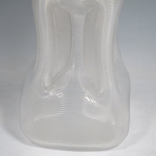 An Antique Victorian large Sterling Silver and cut-crystal glug-glug decanter, having a ribbed body with pinched and fluted central waists, plain round necks with four pouring spouts, and original hand-cut stopper. Made by John N. Mappin of London in 1893. The dimensions of this fine hand-made silver and crystal glug glug decanter are height 29 cms (11.5 inches), and width 13 cms (5 inches).
