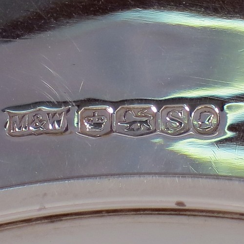 A Sterling Silver Art Deco very elegant style serving dish, having a square-shaped slightly concave body, with hand-pierced geometrical corners, and sitting on a pedestal foot. Made by Mappin and Webb of Sheffield in 1935. The dimensions of this fine hand-made sterling silver Art Deco dish are 23 cms (9 inches) square, height 2.5 cms (1 inch), and it weighs approx. 430g (13.9 troy ounces).